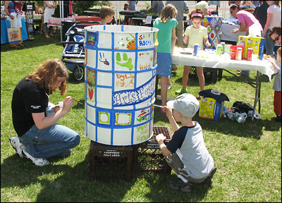 Kids transforming trash to art.