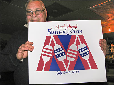 Louis Regilio with his winning logo design.