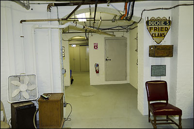 Hallway leading to elevator.