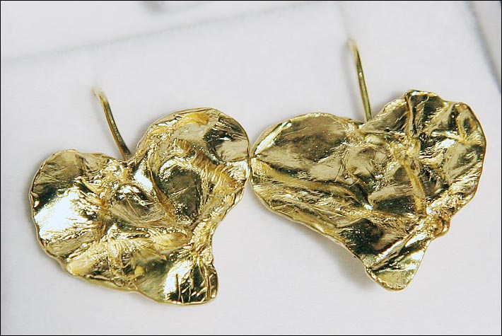 Leaf earrings donated by Bruce Rogers.