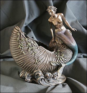 Mermaid on Nautilus shell.