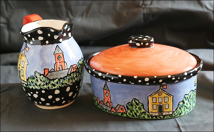 Handpainted pitcher and handpainted covered casserole dish, donated by Hestia Creations.