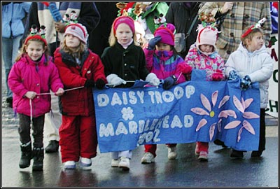 Daisy Troop during the Christmas Walk Parade, December 2002.